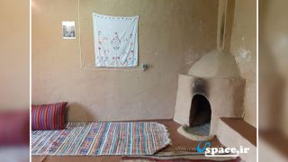 شومینه هیزمی اتاق اقامتگاه بوم گردی ارشاد - بجنورد - روستای قره خان بندی